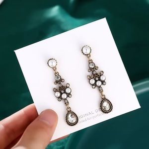 Beautiful very shiny ethnic drop earrings!
